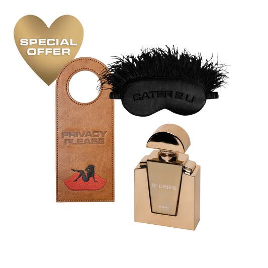 Beyoncé CÉ Lumière bundle with perfume bottle, eye mask, and privacy door hanger with gold and black details