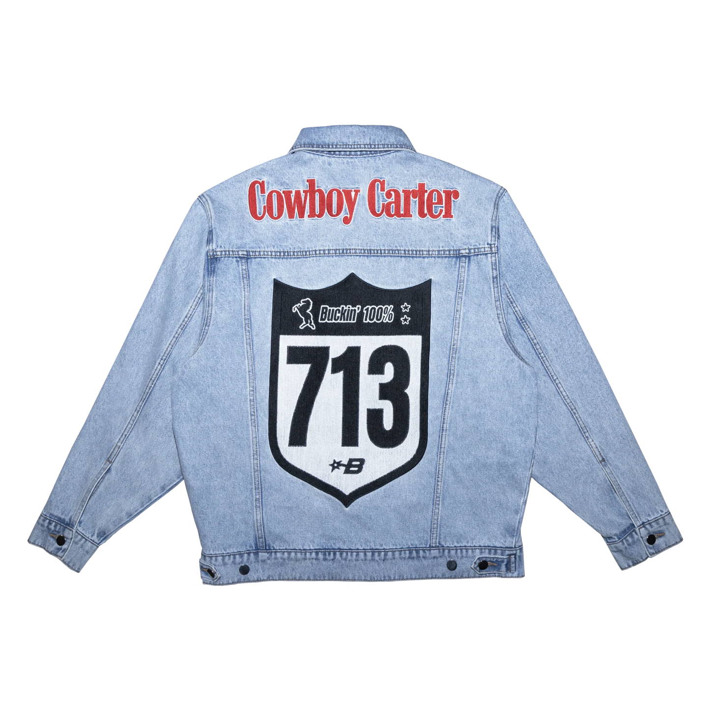 Light blue denim jacket with bold Cowboy Carter text and large 713 graphic patch on back