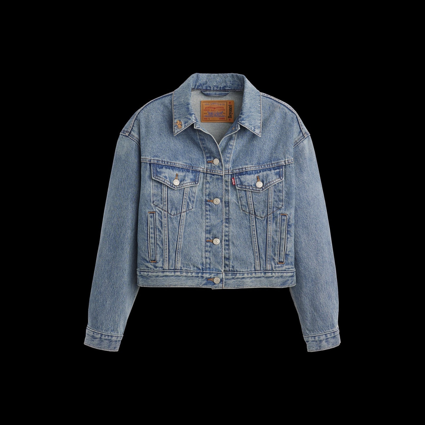 Light blue denim trucker jacket with button front and classic Levi’s design details