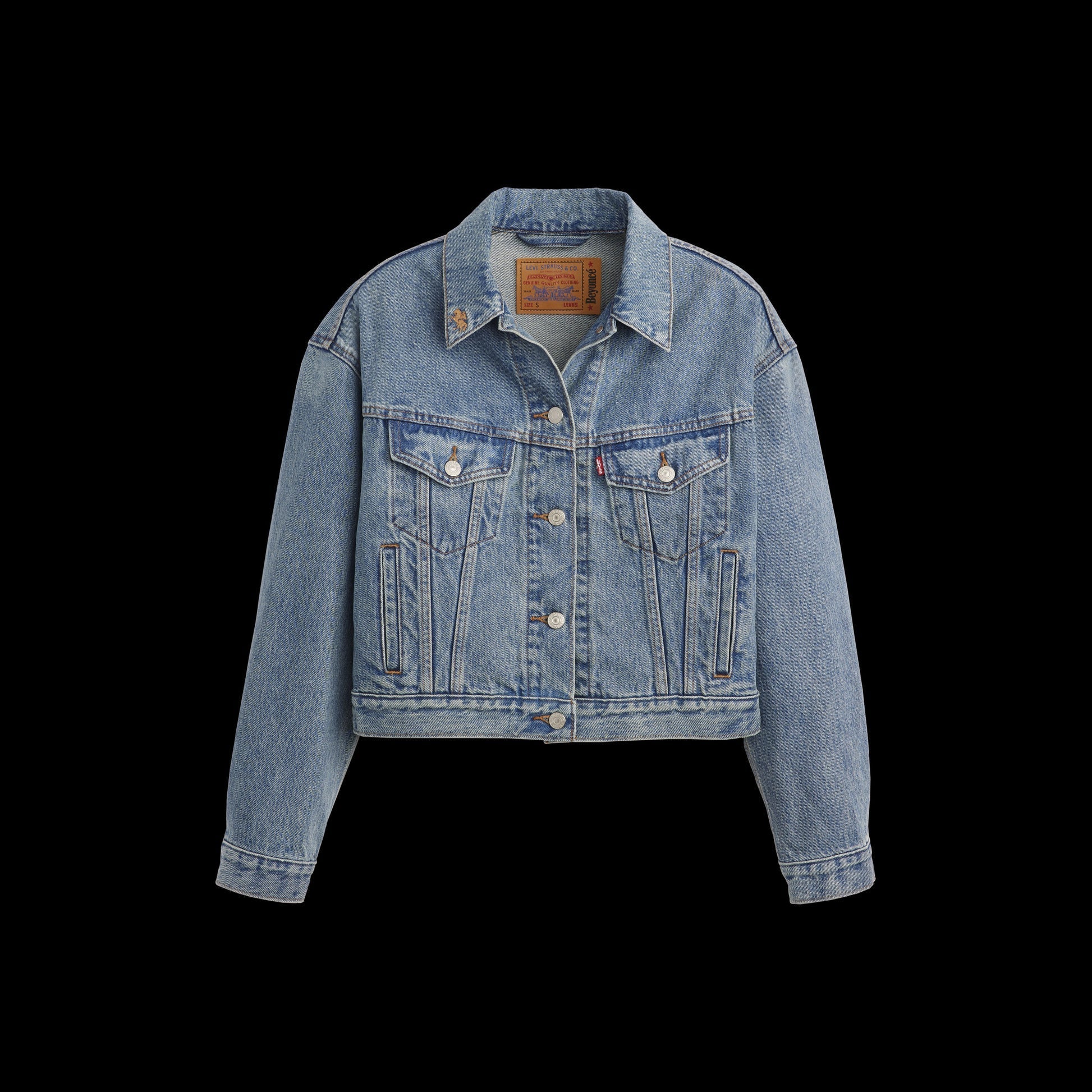 Light blue denim trucker jacket with button front and classic Levi’s design details